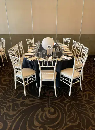Tiffany Chairs around a table