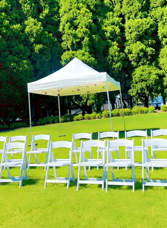 White Gladiator Chairs with Marquee