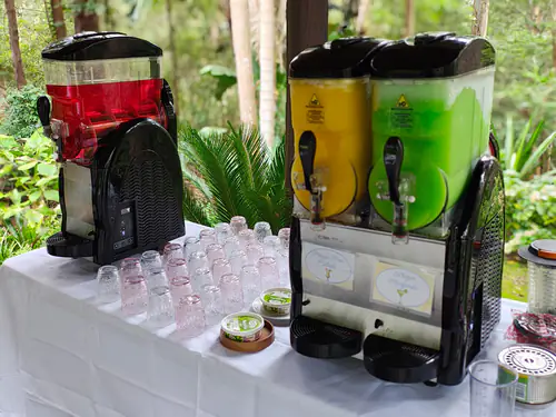 A single and double slushy machine set up and ready for use