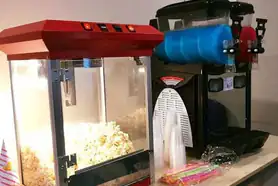A popcorn machine being hired with a Slushie machine