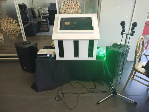 A karaoke machine set up and ready for use at a kids' party