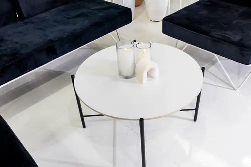 Black cross coffee table with white top