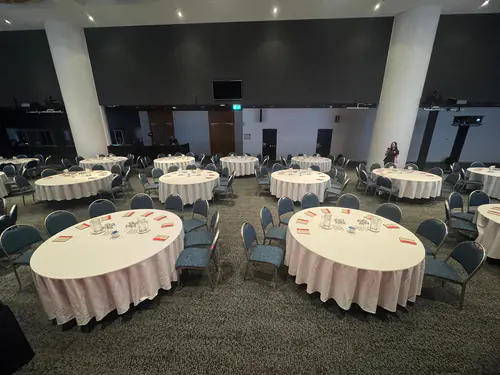 Chairs and tables all set up ready for a function