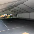 A framed marquee with a basketball court inside.