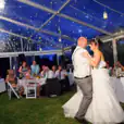 A bride and groom sharing their first dance in an 8m x 9m framed marquee tent.