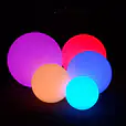 A group of colorful Glow Spheres, measuring 60cm each, illuminating the darkness.