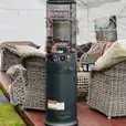Pkg 1 - A gas heater sitting on a deck.