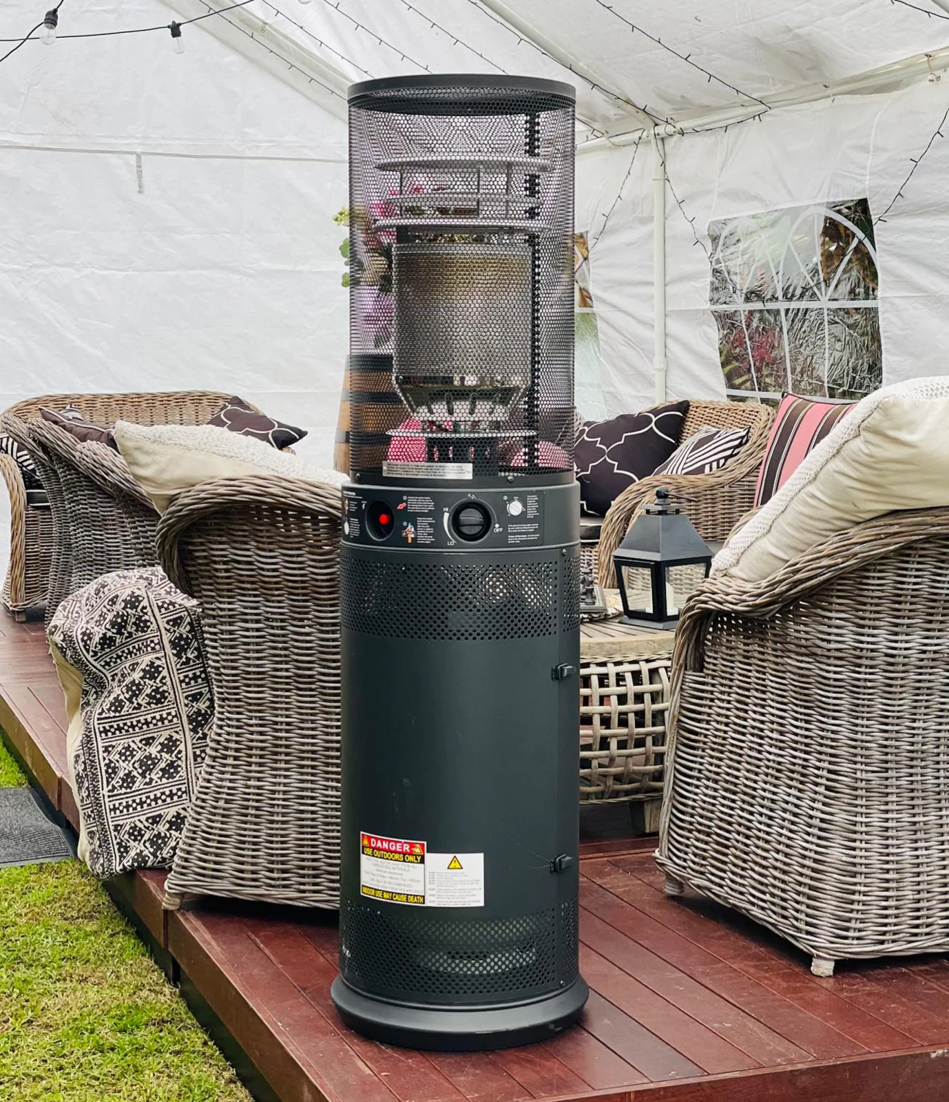 Pkg 1 - A gas heater sitting on a deck.