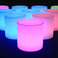 A set of colorful glow cylinders on a black background.