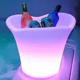 Glowing Ice Tub Hire: Enhance your event with an illuminated ice bucket featuring bottles.