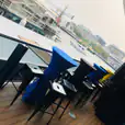 A deck bar with a scenic view of the water.