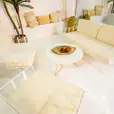 Our white round coffee table on display