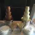 Package 3 includes a table set up with 2 small commercial chocolate fountains.