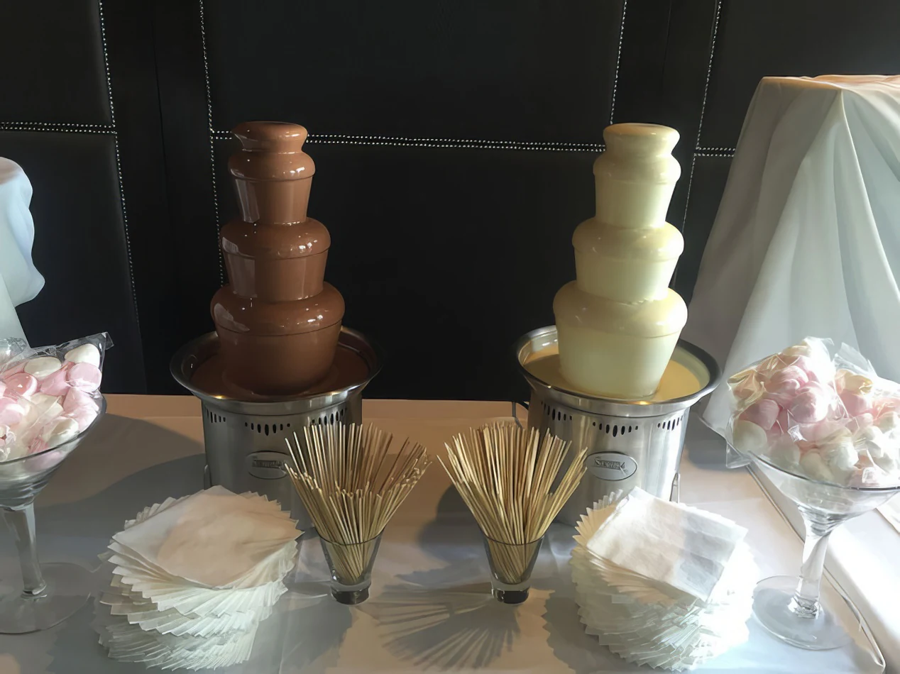 Package 3 includes a table set up with 2 small commercial chocolate fountains.