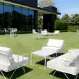 White sofa lounges hired for an outdoor corporate event