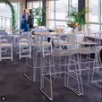 A white table and chairs in a room.
