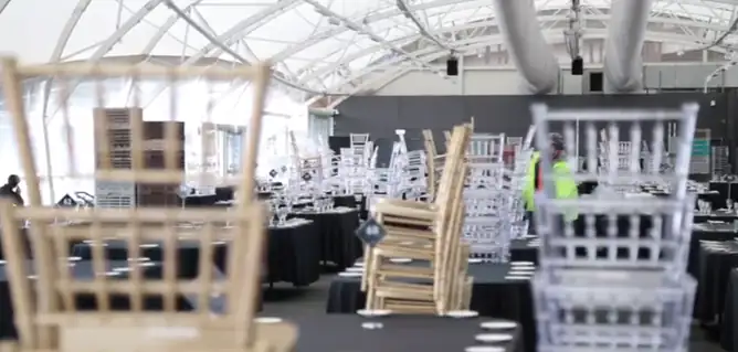 Stacked event chairs ready for setup