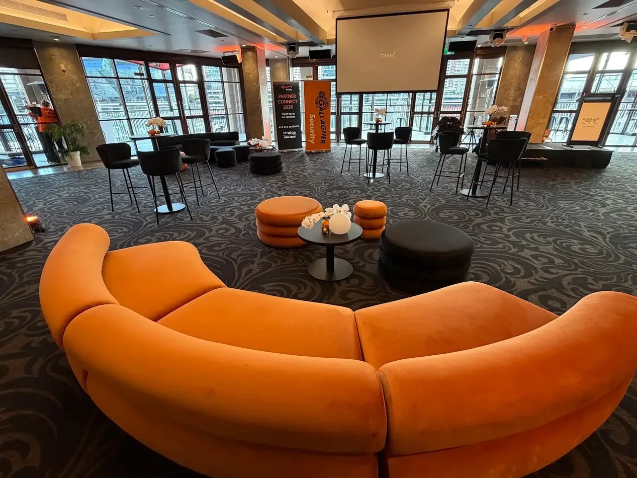 Black velvet Apollo curved lounges arranged for a Sydney event