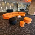 Small black velvet Apollo ottomans used as flexible event seating