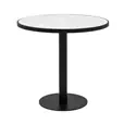 Atlas round coffee table with black frame and white top at a corporate event lounge