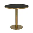 Atlas round coffee table with gold frame and black top at a corporate event lounge area