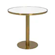 Atlas round coffee table with gold frame and white top at a luxe event lounge