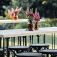 Black thonet bentwood stools paired with black tapas tables at a modern event venue