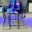 A table with chairs and a Black Arrow Stool.