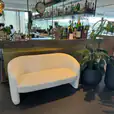 A Bouncle sofa at a bar