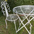 Ceremony signing table and chair set in an outdoor grassy area