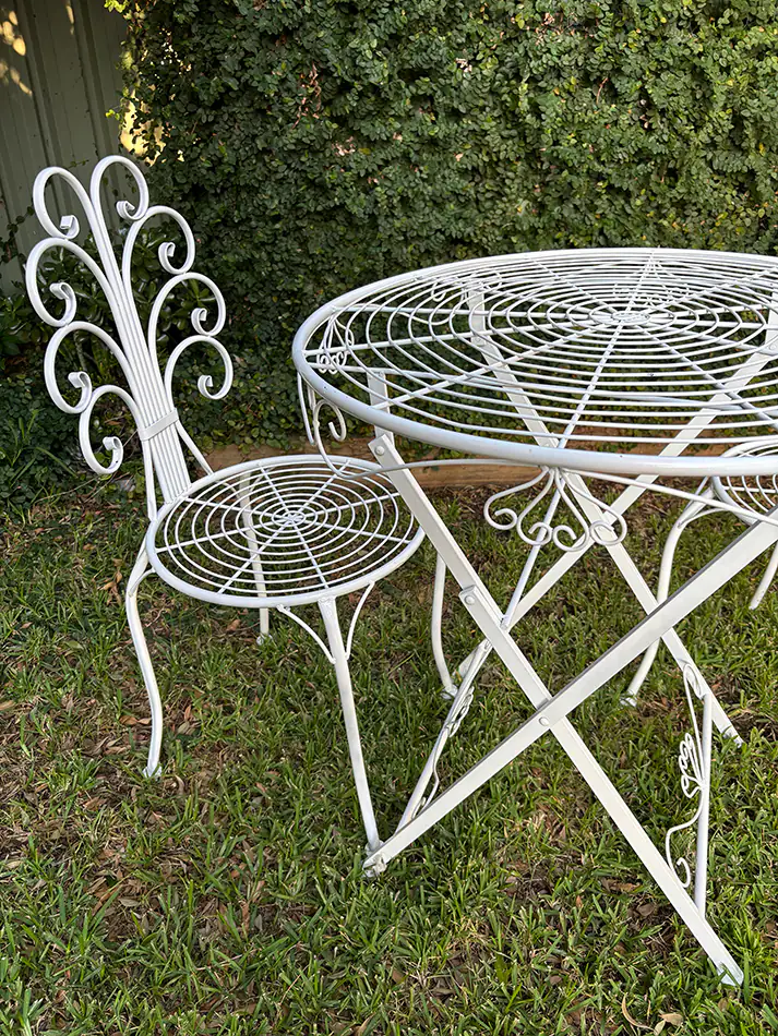 Ceremony signing table and chair set in an outdoor grassy area