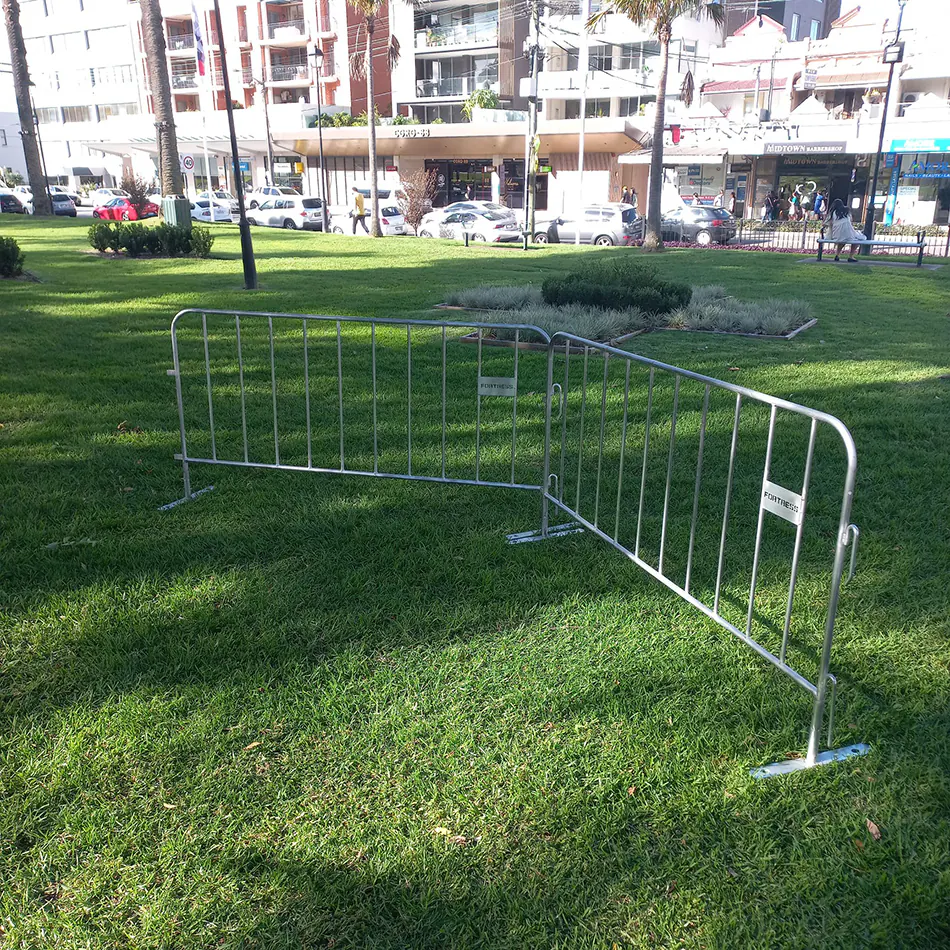 Our crowd control barriers on the grass in a park