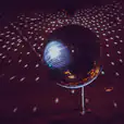 A spinning disco ball with lights