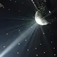 A disco ball with smoke and lighting