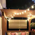 Two pictures of a porch adorned with string lights and pillows, featuring Festoon Light Hire - 10m.