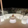 A glowing white table with chairs.