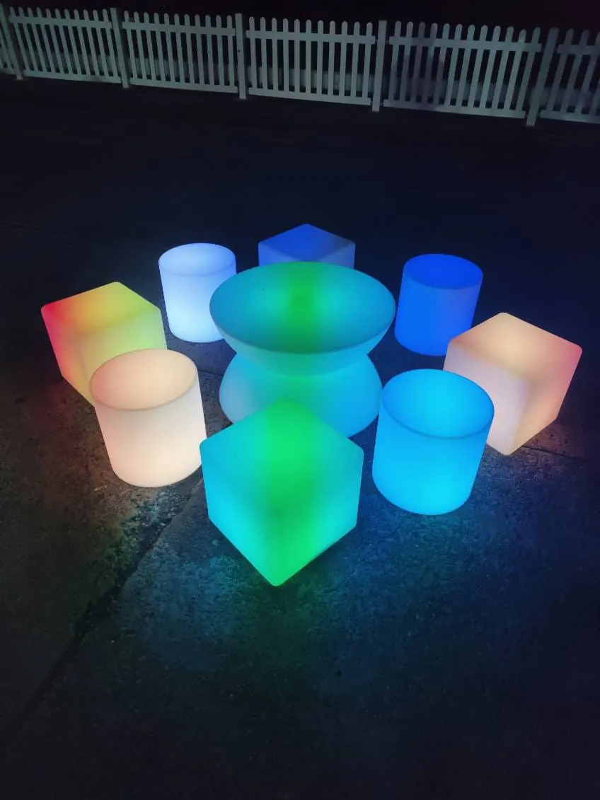 Glow yo-yo coffee table being used outside at night
