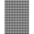 Black and white houndstooth pattern rug laid flat