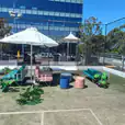 Our premium market umbrella being hired around a tennis court