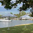 Market umbrellas on the edge of a lake providing shade
