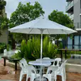 Market umbrellas in an outdoor corporate setting