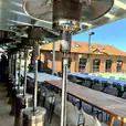 Mushroom heaters at an outdoor tennis club