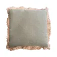 An olive green linen-look cushion with a natural jute fringe border, photographed against a white background