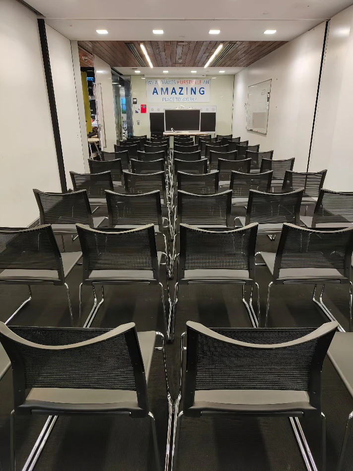 Our conference chairs set up in a room