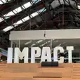 Our glow letters hired to spell the word impact
