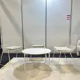Our white cross coffee table with white wire chairs