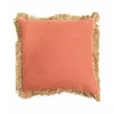 A peach cushion with a natural jute fringe border, photographed against a white background