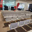 Premium white conference chairs hired for an indoor conference
