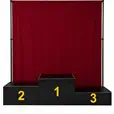 Red curtain draping with black winners podium blocks numbered one, two and three for an event or presentation display