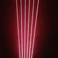 An image of a red light in a dimly lit room.